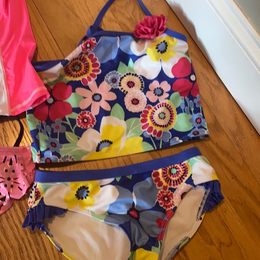 Lot of 2 girls bathing suits, 2 rash guard shirts.